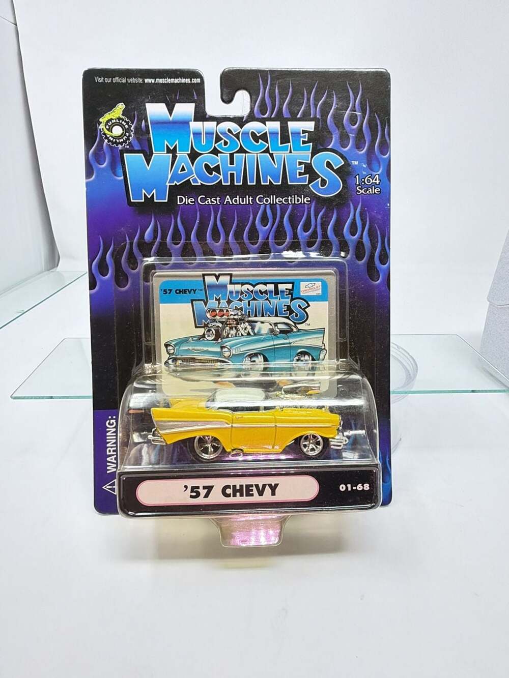 Muscle Machines '57 Chevy 1:64 Scale Yellow Die Cast Adult Collectible